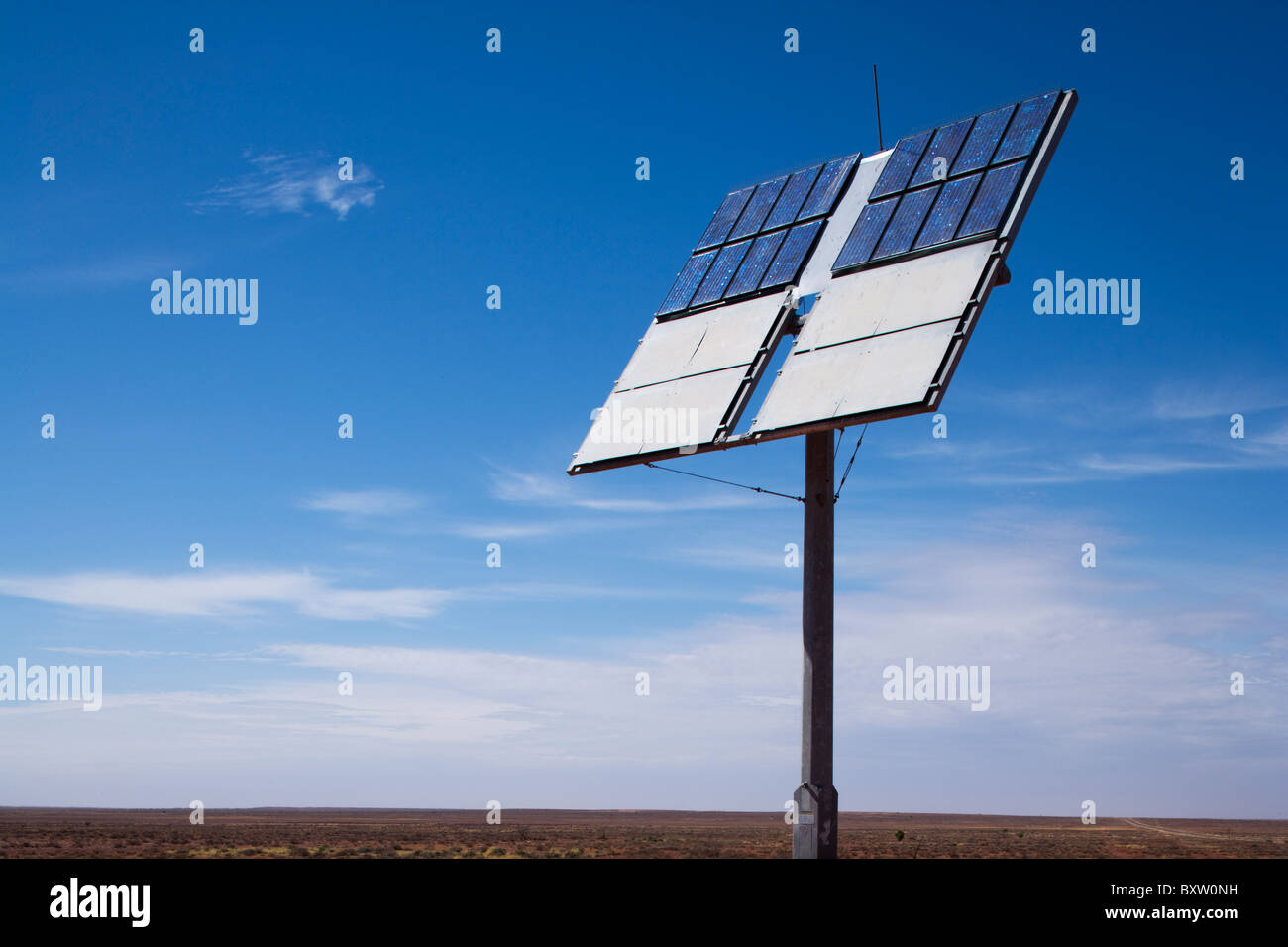 Australia, South Australia, Coober Pedy, Solar panel in outback desert along empty stretch of Stuart Highway on summer morning Stock Photo