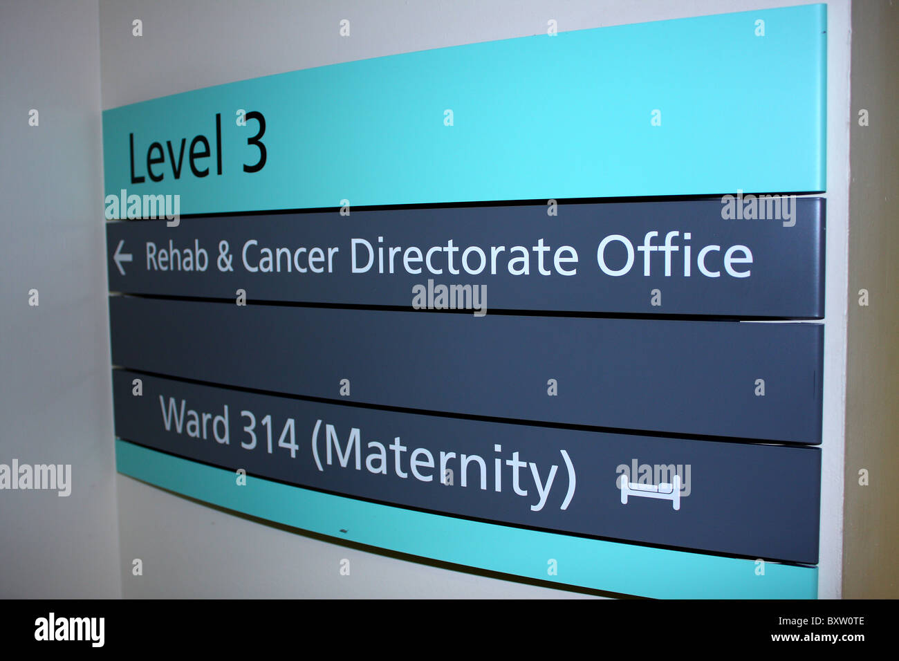 The sign for Level 3 Rehab and Cancer Directorate Office as well as the Maternity ward 314 at Derby Royal Hospital Stock Photo