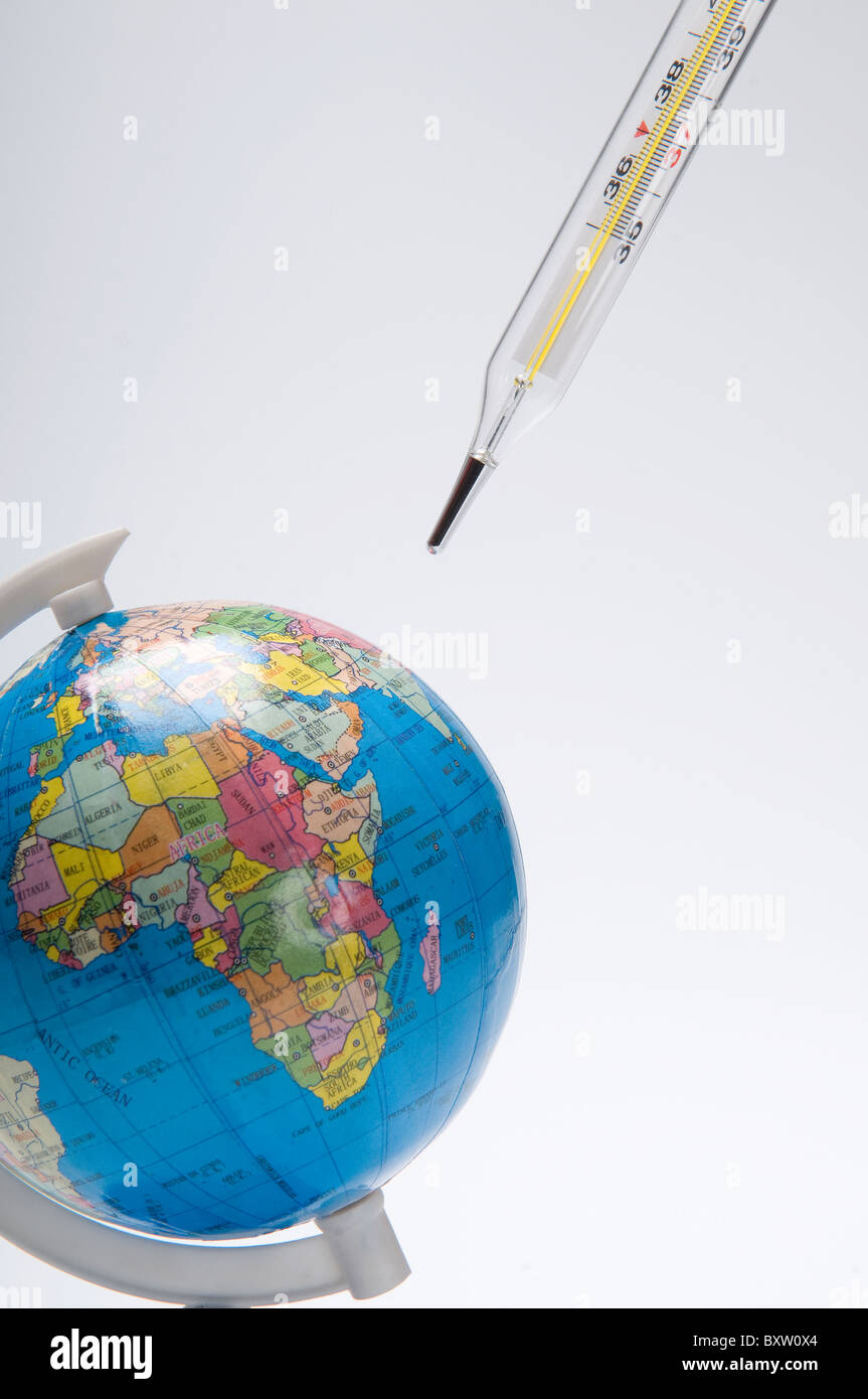 Thermometer with an earth globe Stock Photo Alamy