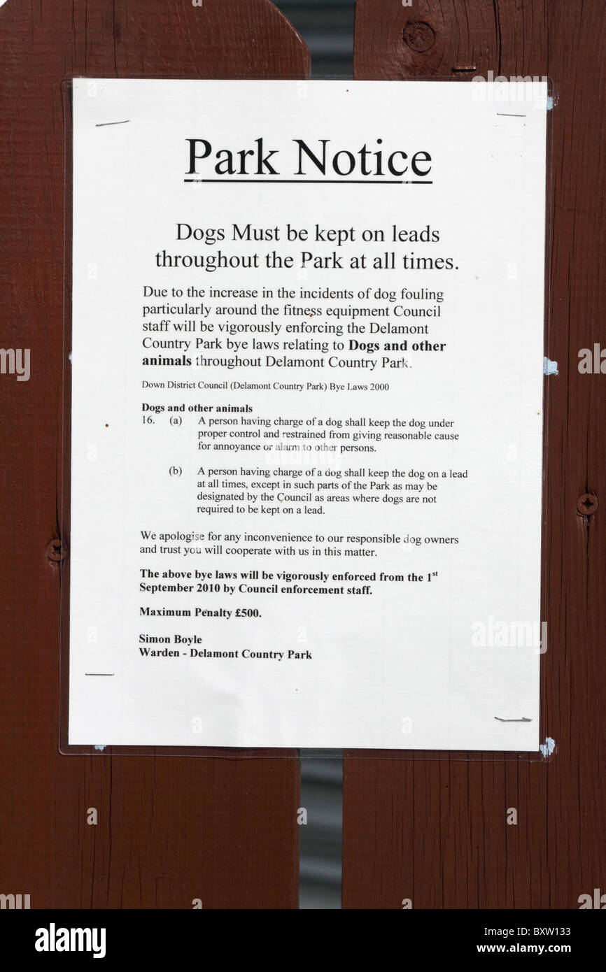 Park notice warning dog owners to control their animals Stock Photo