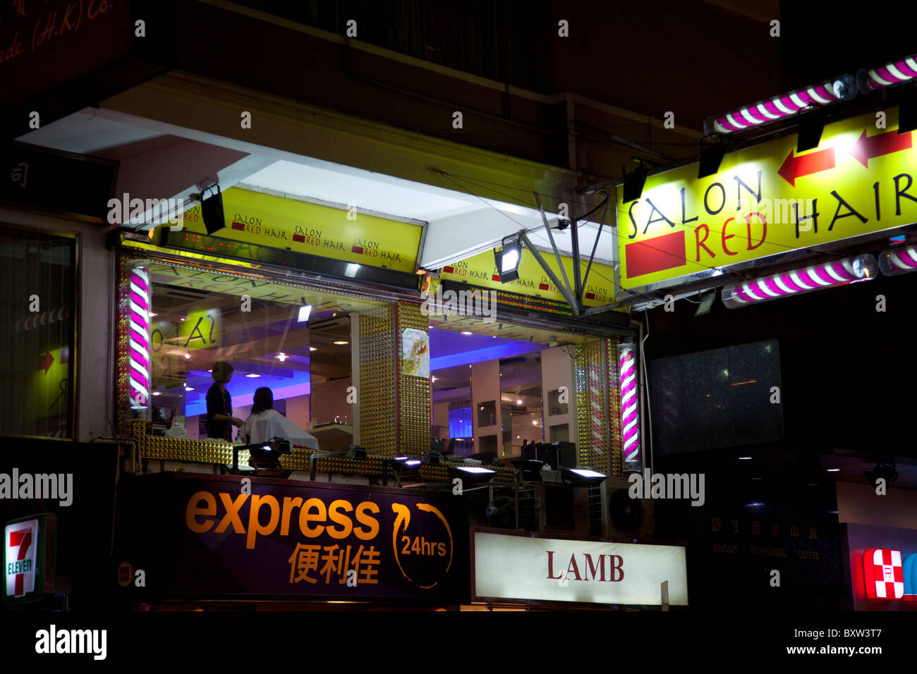 Nathan Road at night Tsim Tsa Tsui Kowloon Hong Kong China, hairdresser