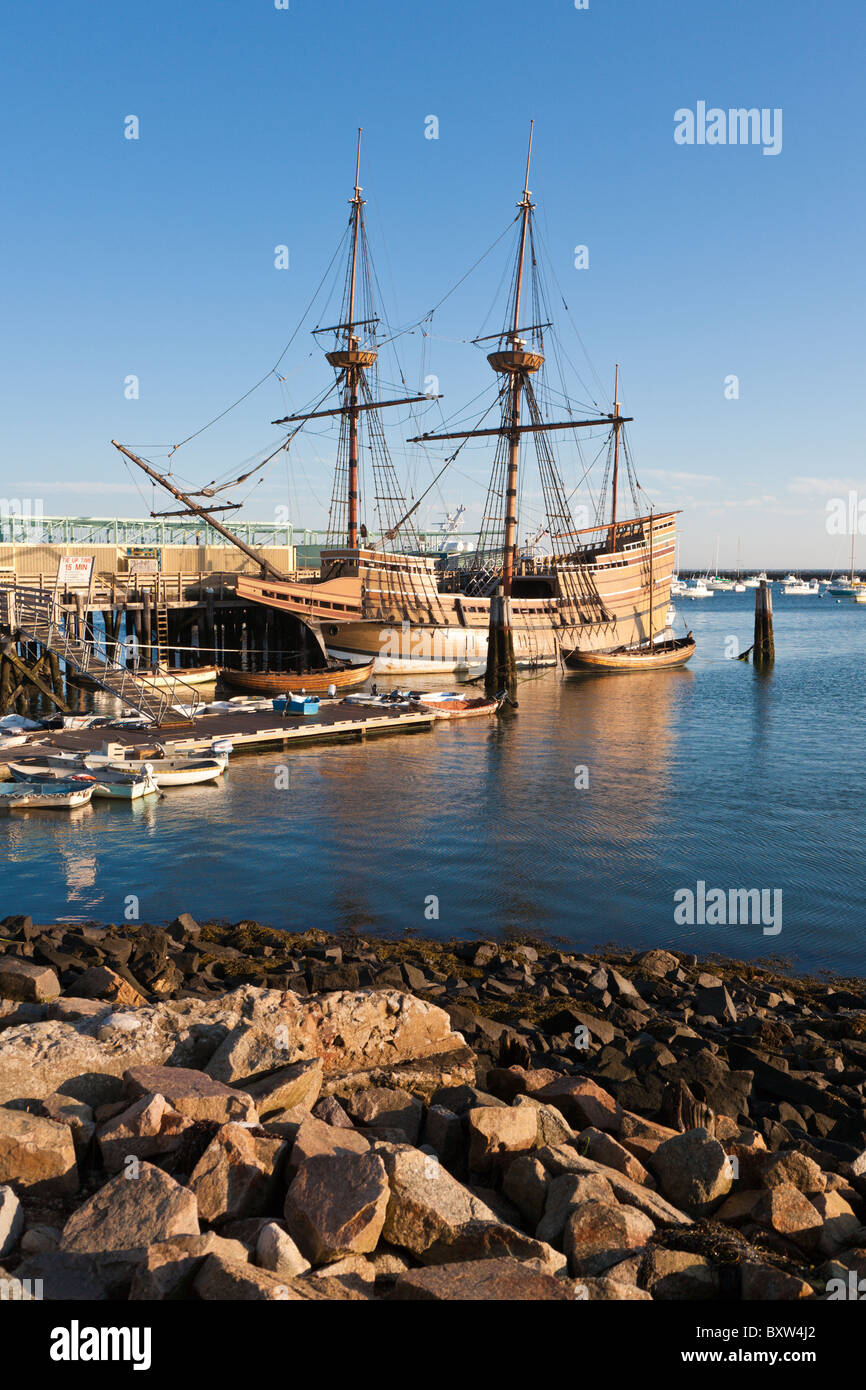 Mayflower II and other boats moored in Plymouth Harbor at dawn in Plymouth Massachusetts Stock Photo