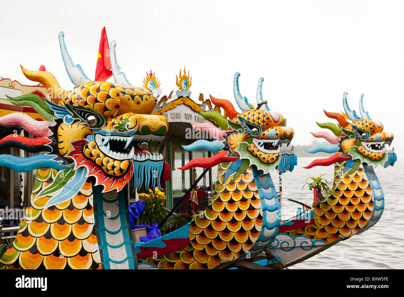 Dragon boats on the Perfume River, Hue, Vietnam Stock Photo