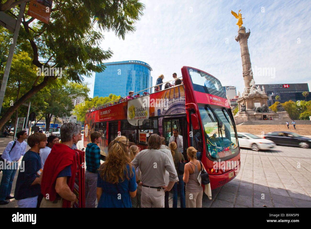 Tour bus at Angel de la Independencia on Paseo de la Reforma in Mexico City Stock Photo