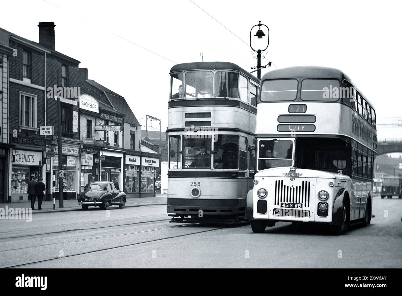 Leyland Bus and Tram on the Wicker in Sheffield South Yorkshire 1960 Stock Photo