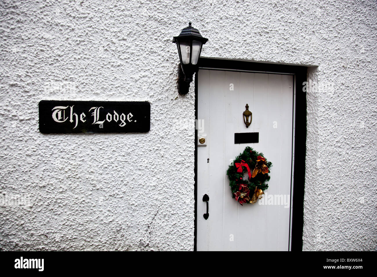 Christmas Wreath Hanging On A Cumbrian Cottage Door Near High Wray