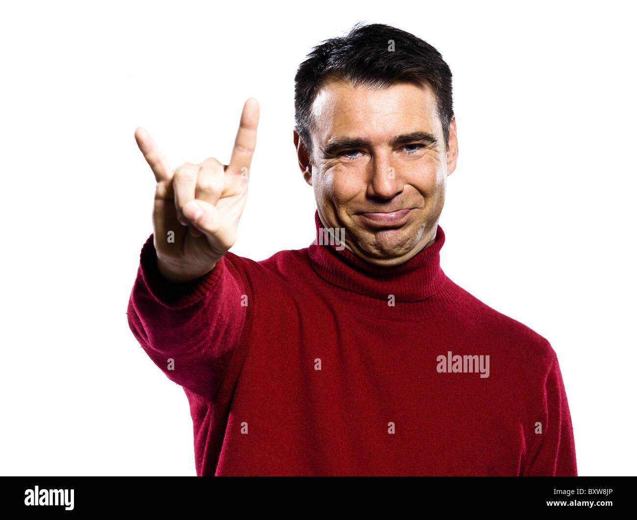 caucasian man mocking  obscene cuckold gesture studio portrait on isolated white backgound Stock Photo