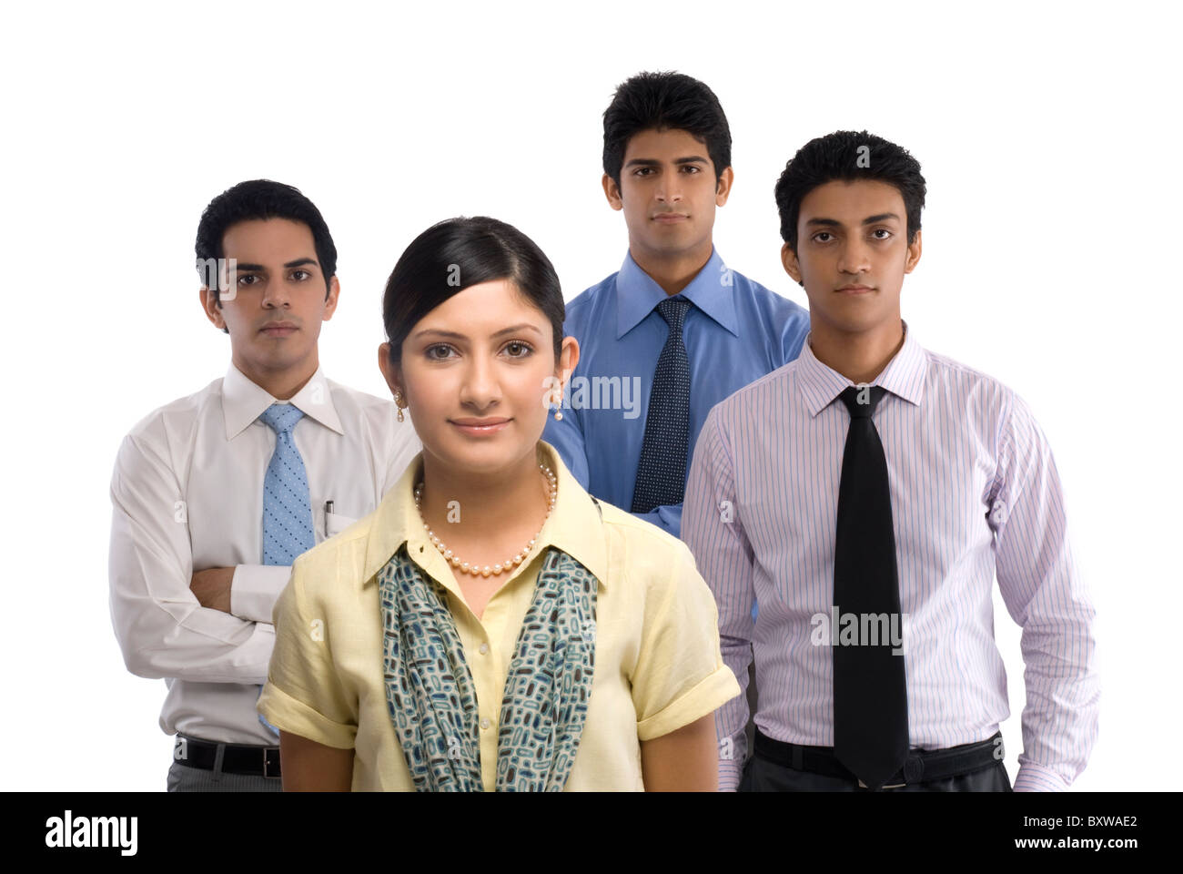 Four business executives standing together Stock Photo - Alamy