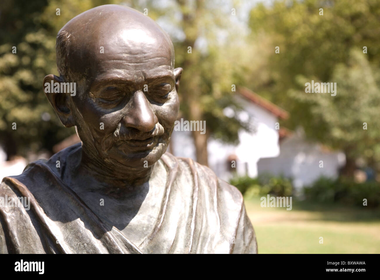 Statue of Mahatma Gandhi in the Sabarmati Ashram (also known as the Gandhi or Satyagraha or Harijan Ashram) in Ahmedabad, India. Stock Photo