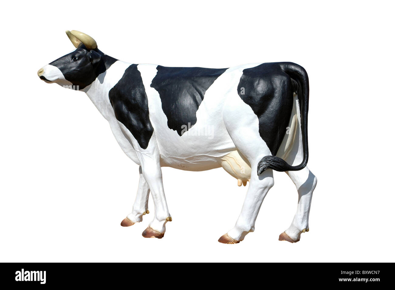 black and white plastic Cow figure isolated on white background Stock Photo