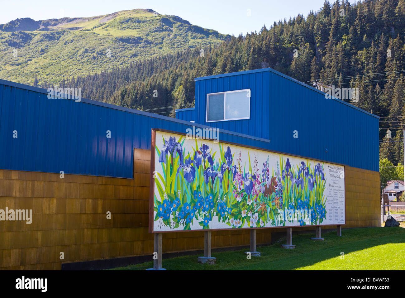 Painted mural on buildings in downtown Seward Alaska on the Kenai peninsula of Alaska Stock Photo