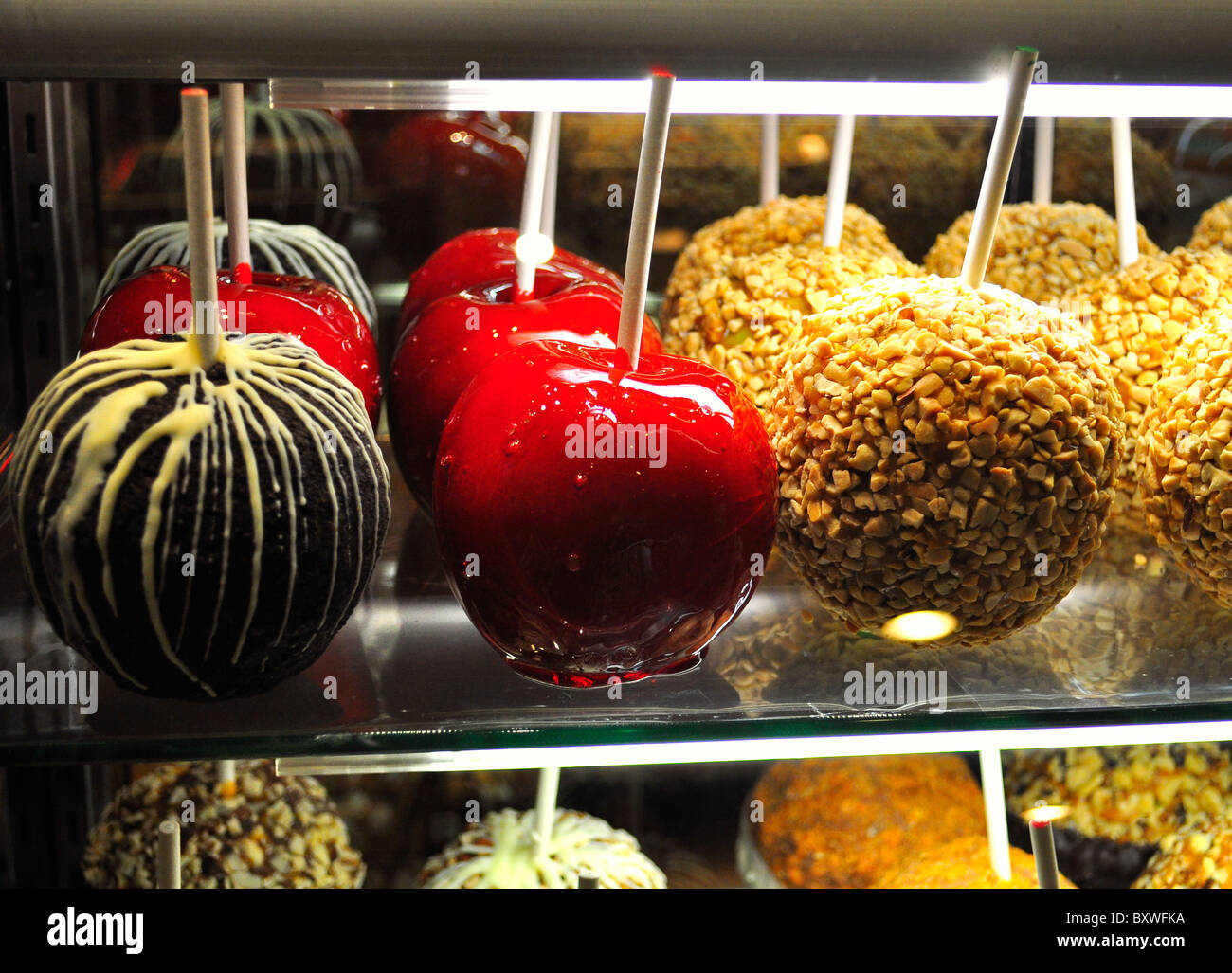 Toffee Apples, Sweet Candy Apples on display Stock Photo