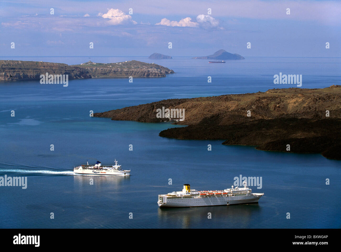 Cruise Ships near Volcano Nea Kameni, Santorin (Santorini), Greece Stock Photo