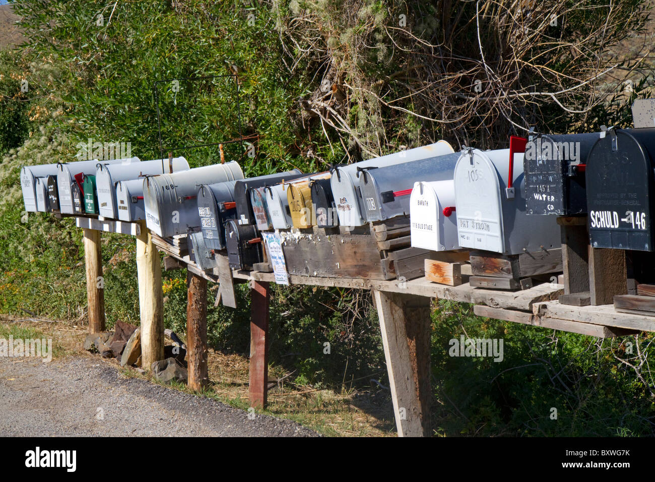 Mailboxes lined up for the delivery of mail in a rural area near Challis, Idaho, USA. Stock Photo