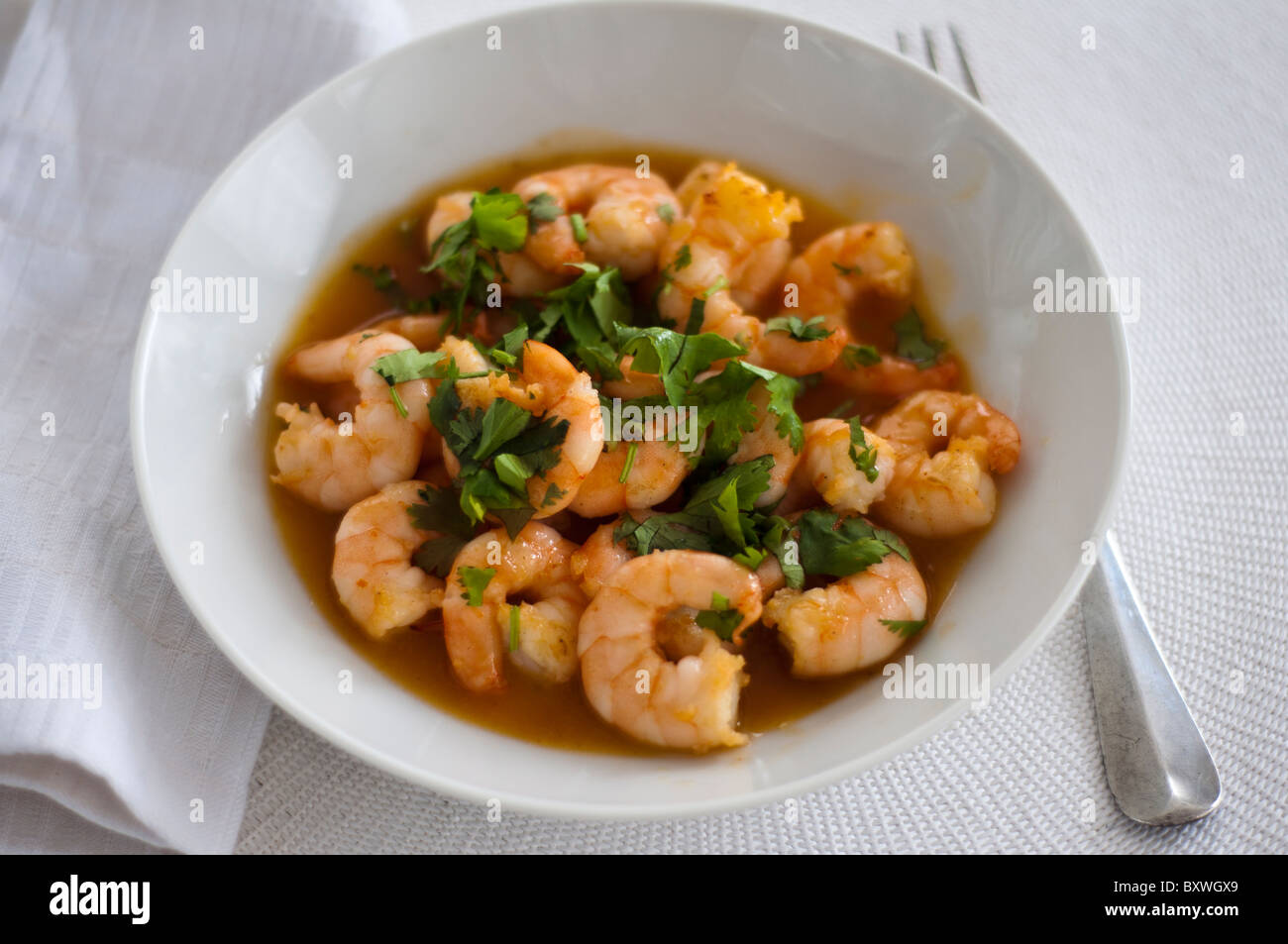 Simple dish of large prawns stir fried with garlic, and Thai sweet