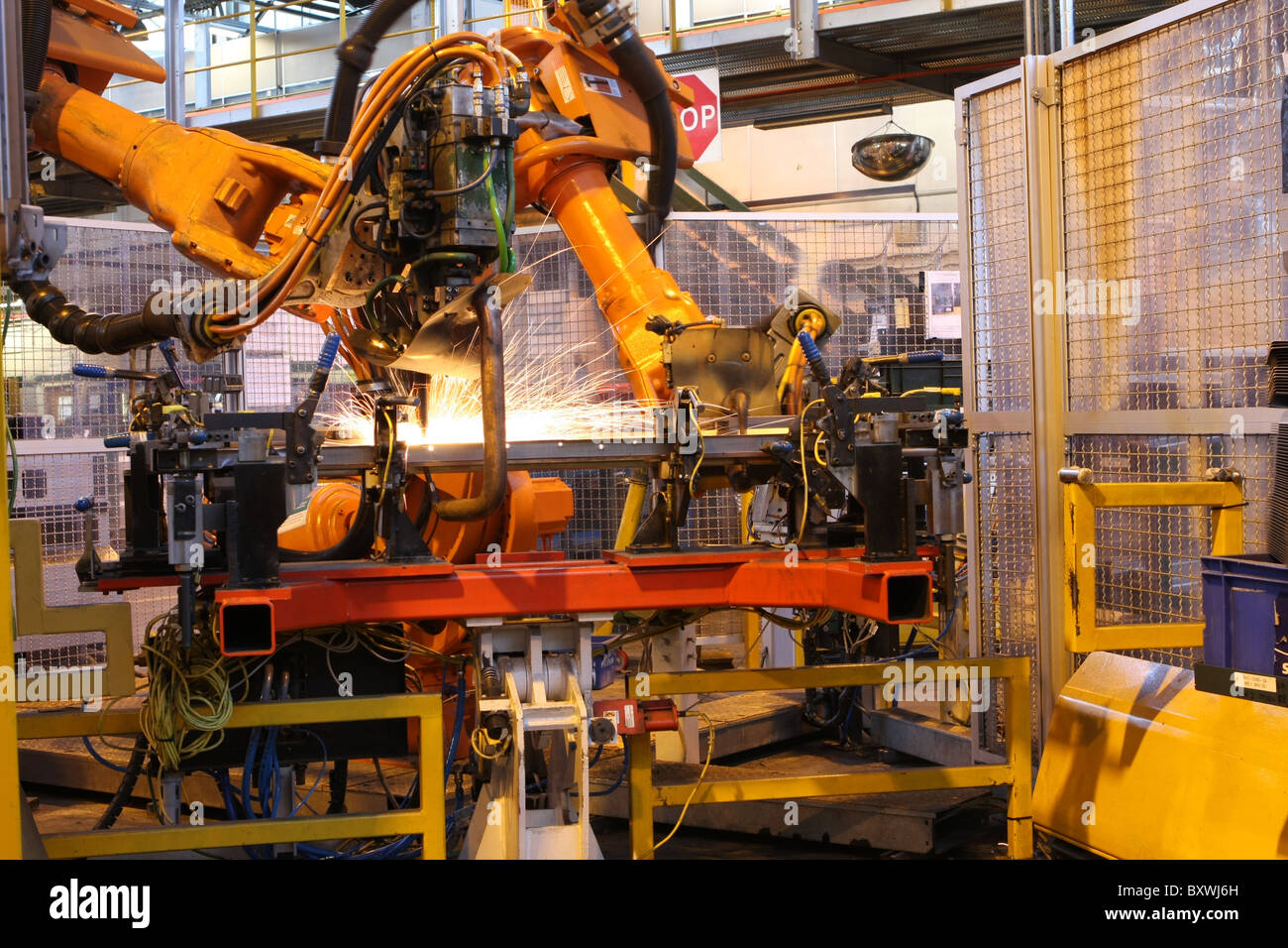 Welding robots making Land Rover Defender bodies Stock Photo