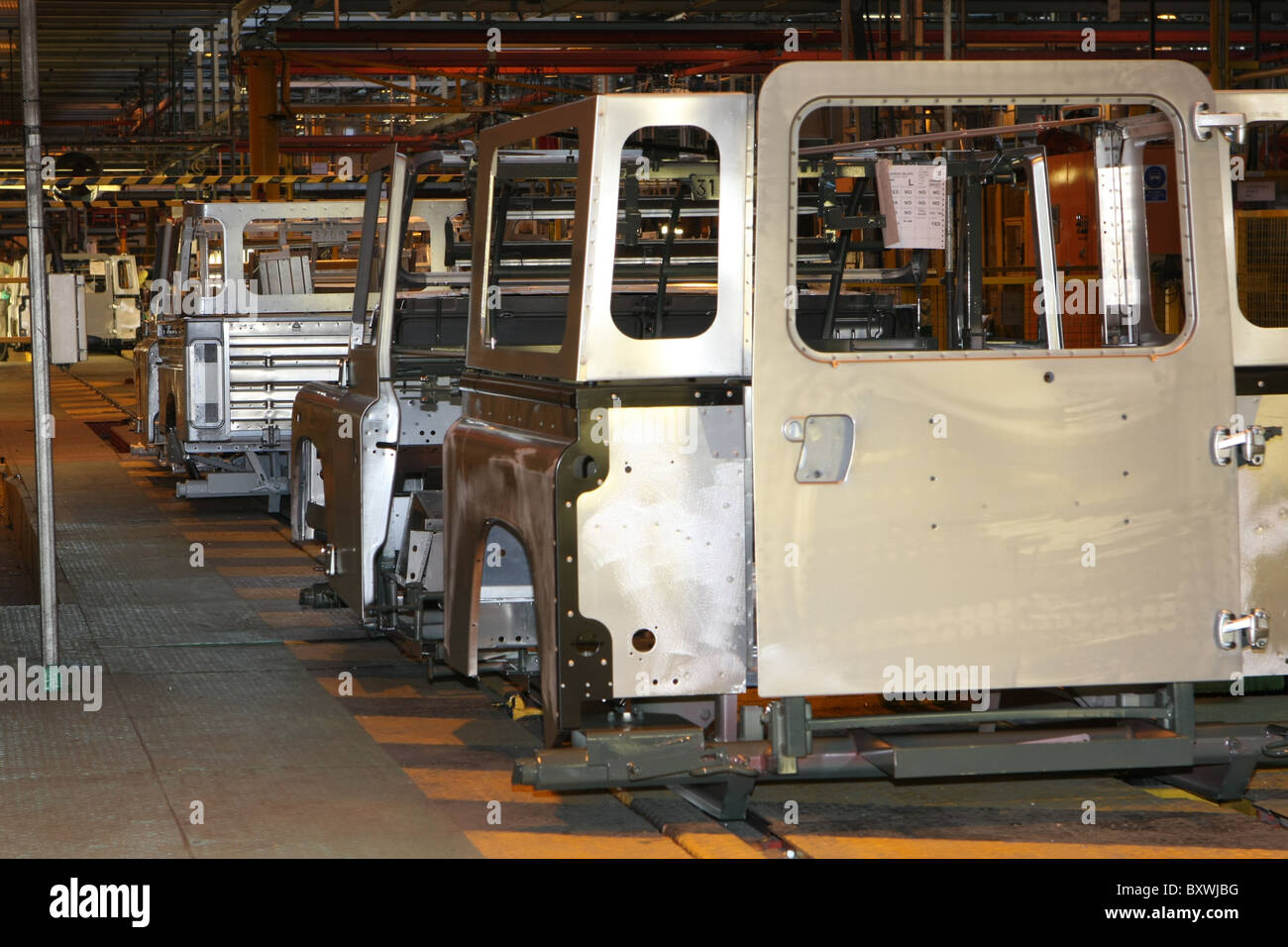 Complete Land Rover Defender bodies leave body-in-white for painting Stock Photo