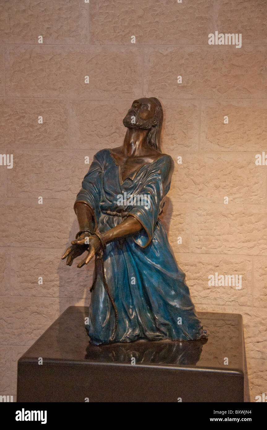 Bronze statue of the Suffering Servant (Jesus Christ) presently residing in the dungeon under what may have been Caiaphus' home Stock Photo
