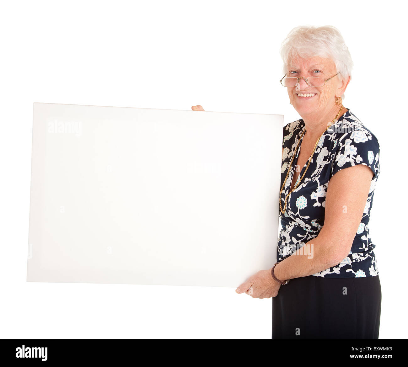 Middle aged woman holding sign hi-res stock photography and images - Alamy