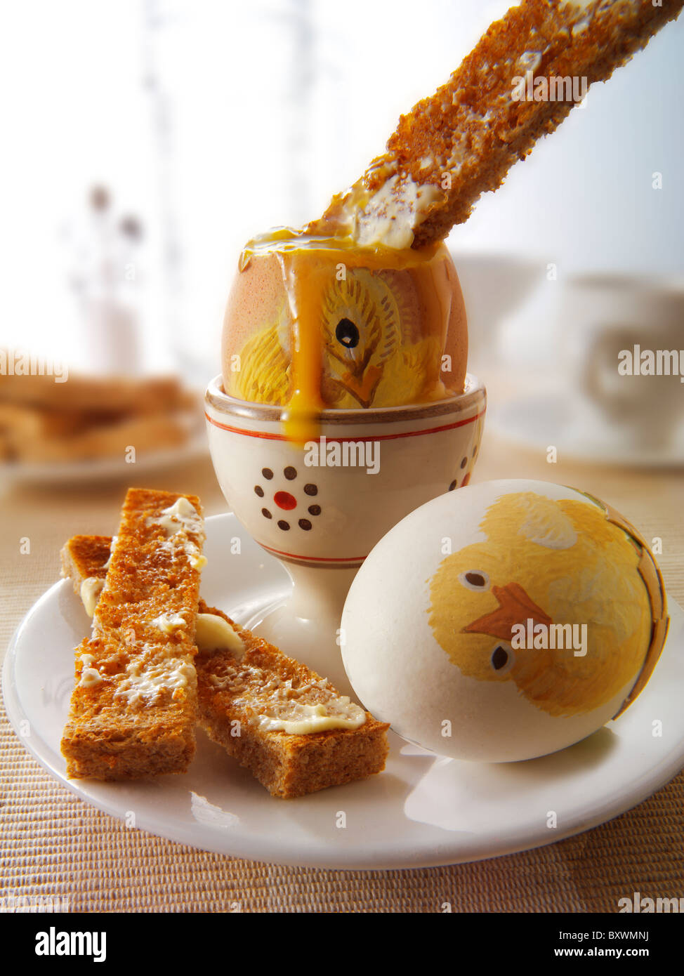 Decorated festive Easter eggs being eaten for breakfast Stock Photo Alamy