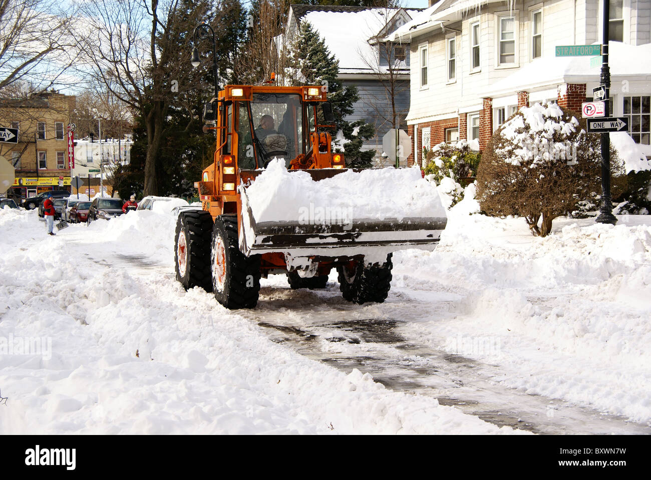 Bulldozer helps in snow cleaning effort in New York Stock Photo Alamy