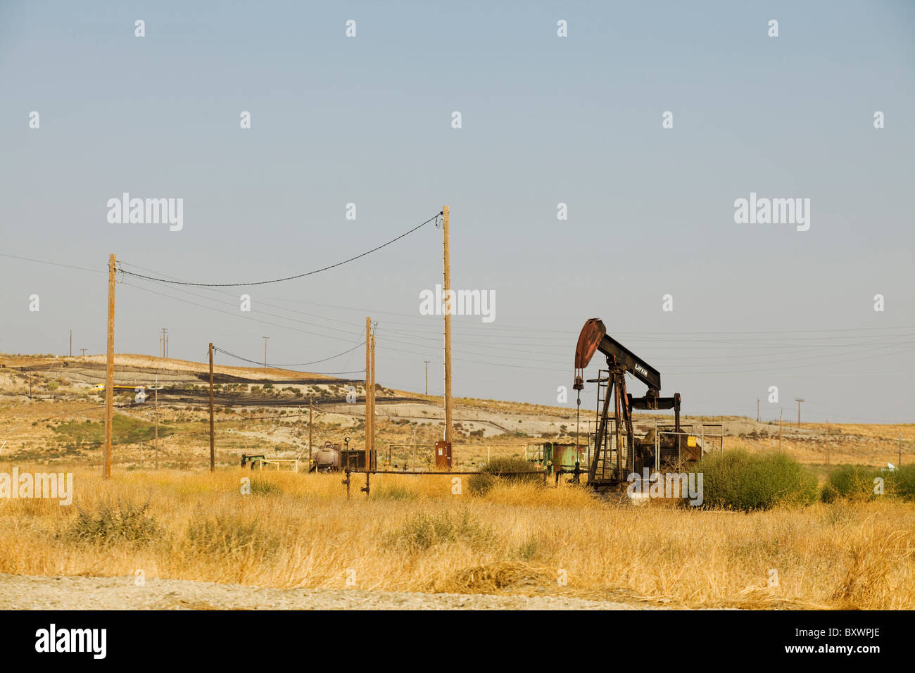 Oil pumpjack - Kern River Oil Field, Coalinga, California USA Stock Photo