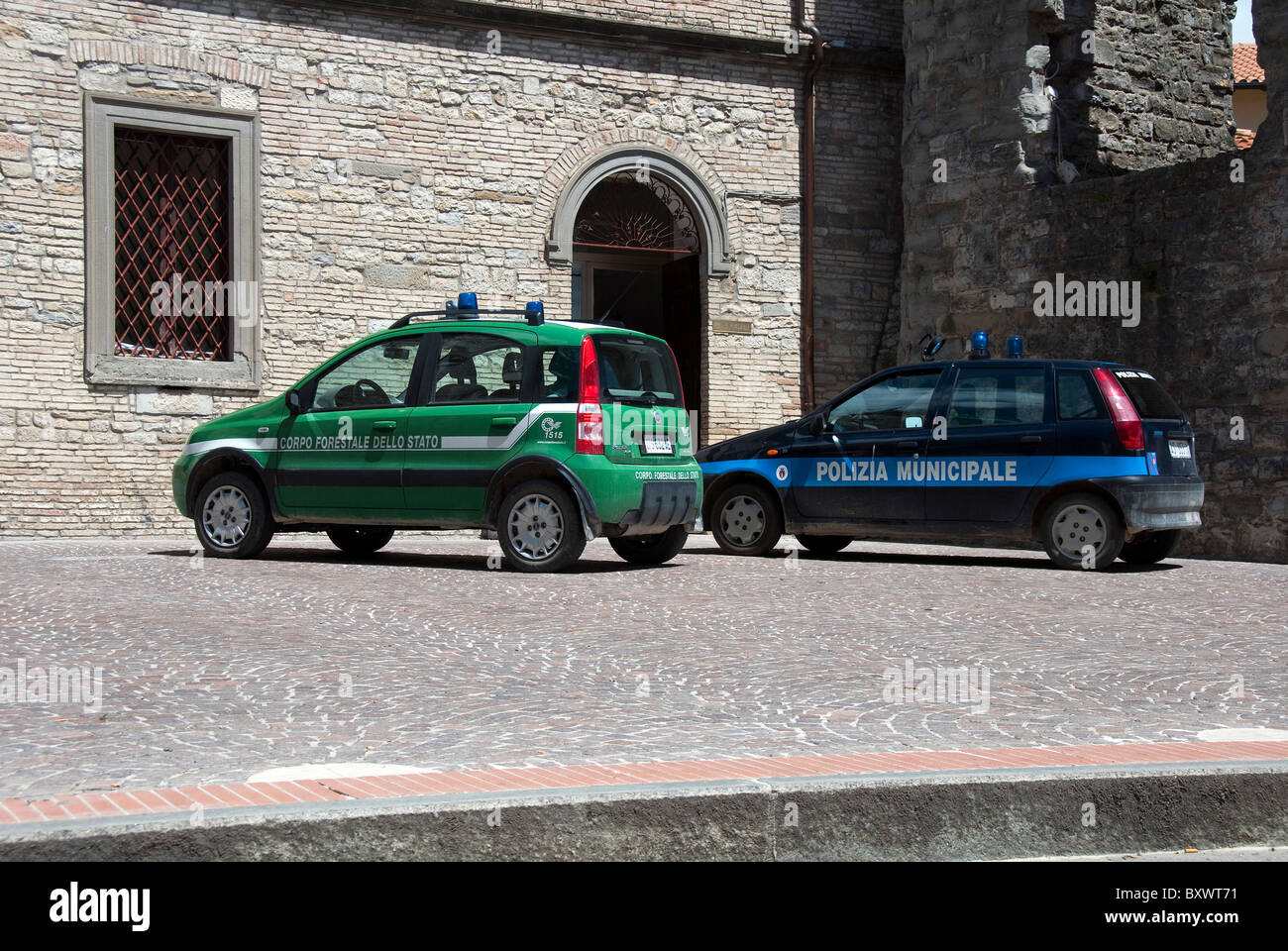 Patrol cars of the Corpo Forestale dello Stato (State Forestry Police) left and Polizia Municipale (Municipal Police) right Stock Photo