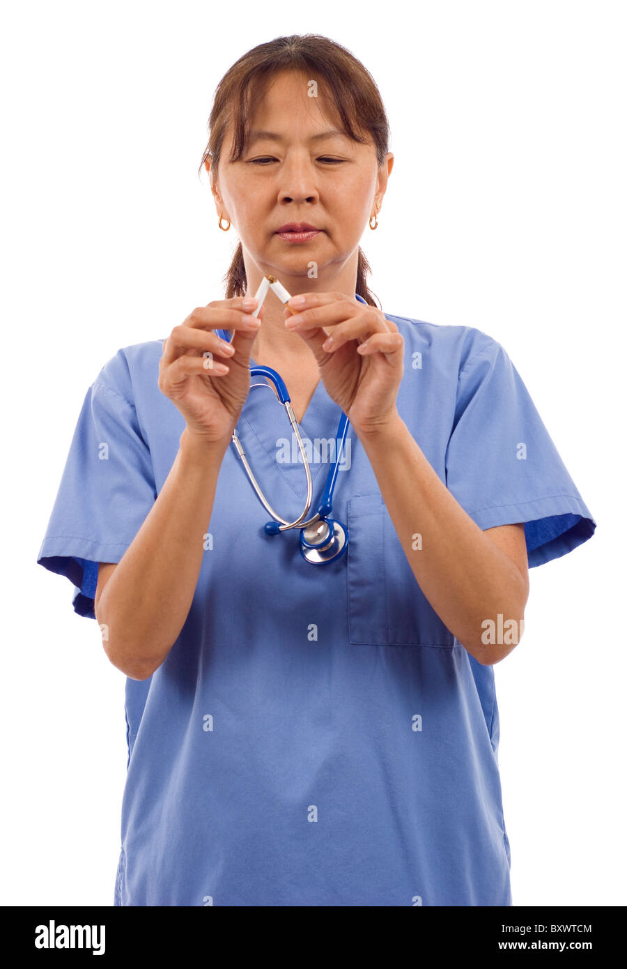 Quit Smoking Senior Asian Doctor Breaking A Cigarette Isolated Over