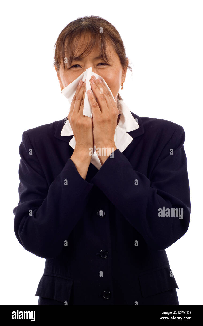 Elderly Asian woman with allergy or cold, isolated over white background Stock Photo