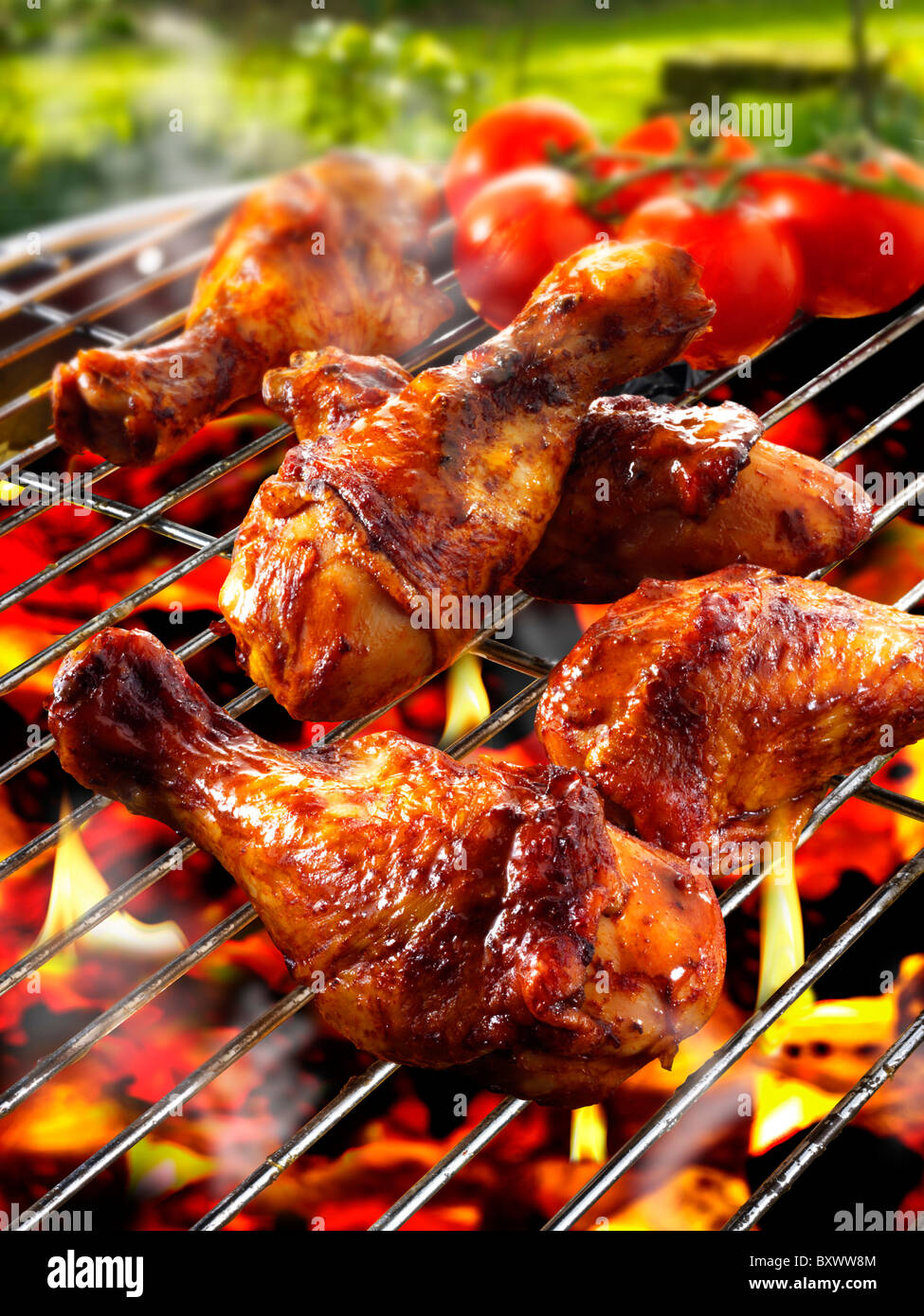 Barbecue chicken legs & thighs on a BBQ grill Stock Photo - Alamy