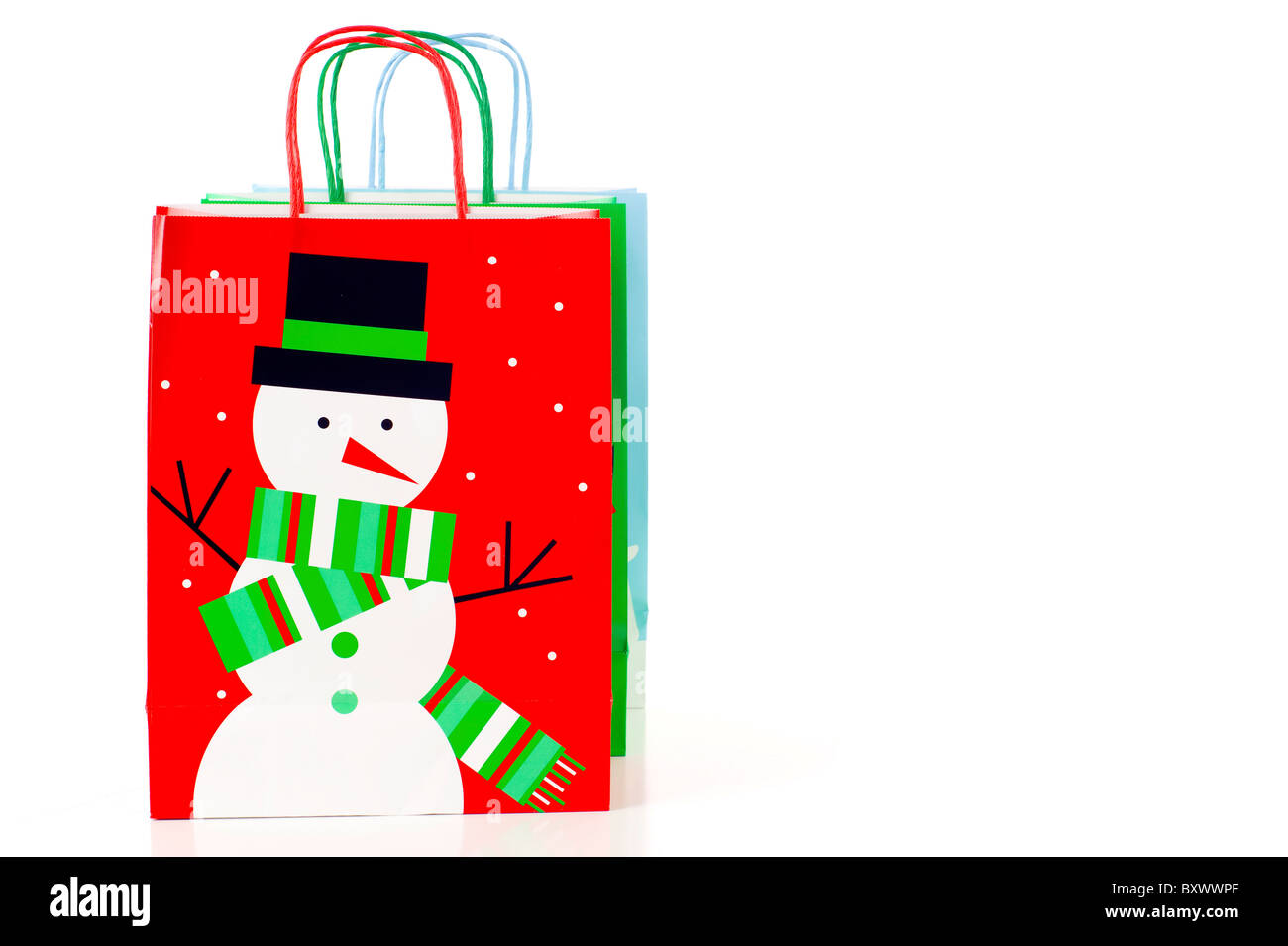 Christmas Shopping Bags, a lot of Copyspace - Isolated over a white background Stock Photo