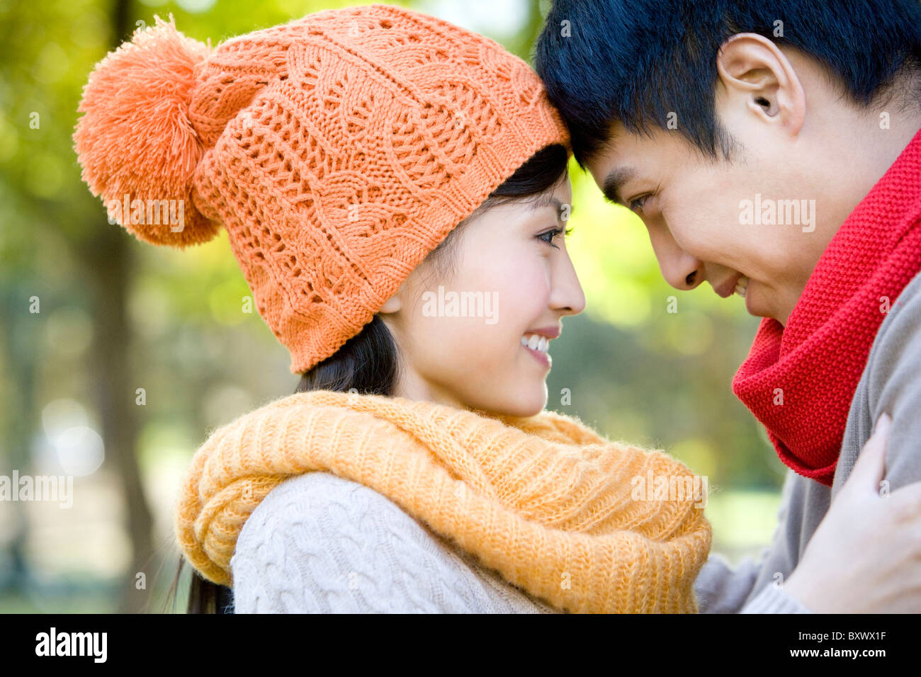 Young Couple in a Park in Autumn Stock Photo - Alamy