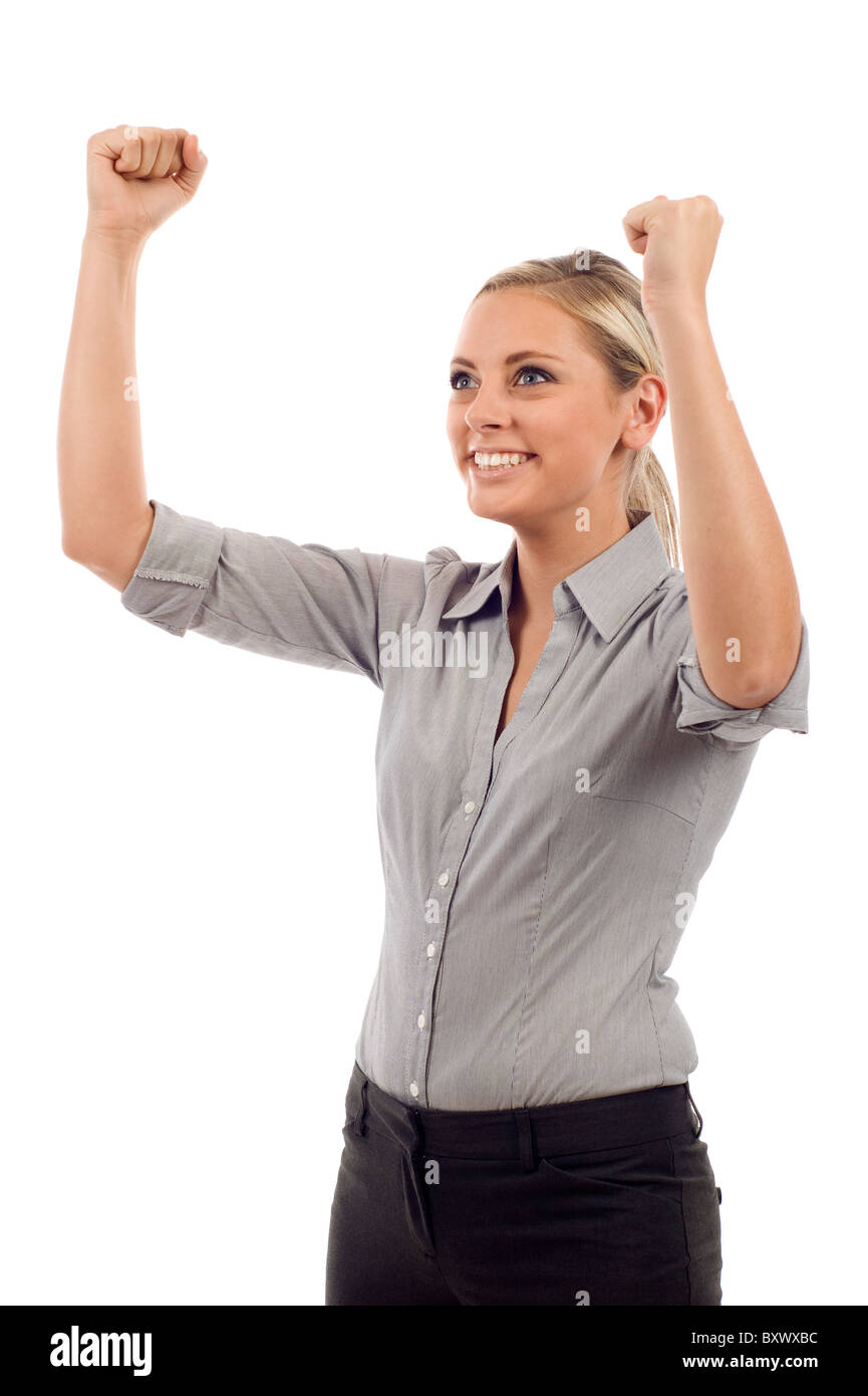 Excited young business woman with her clenched fist isolated over a