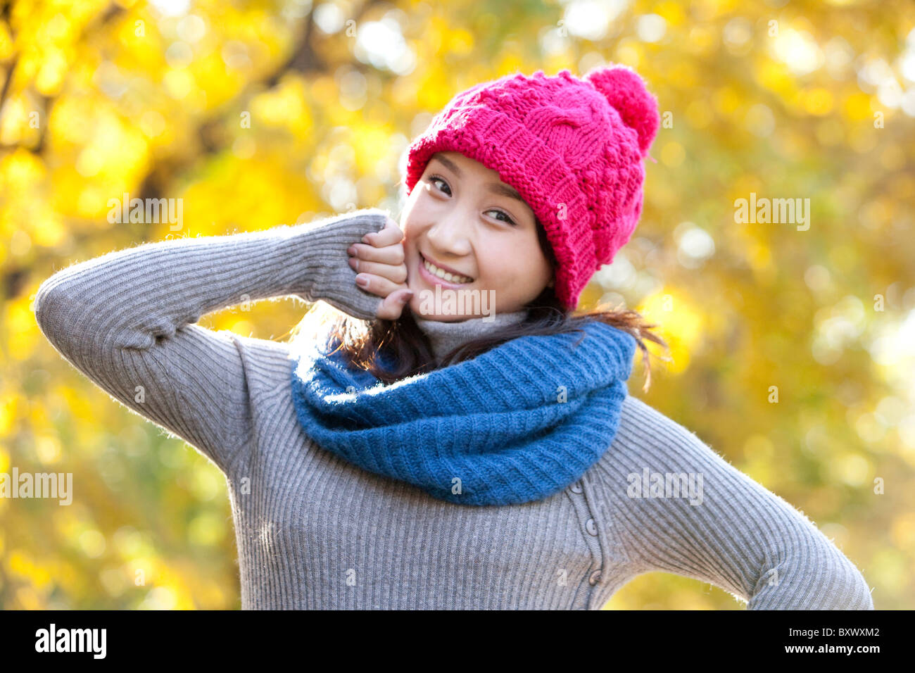Young Woman in a Park in Autumn Stock Photo - Alamy