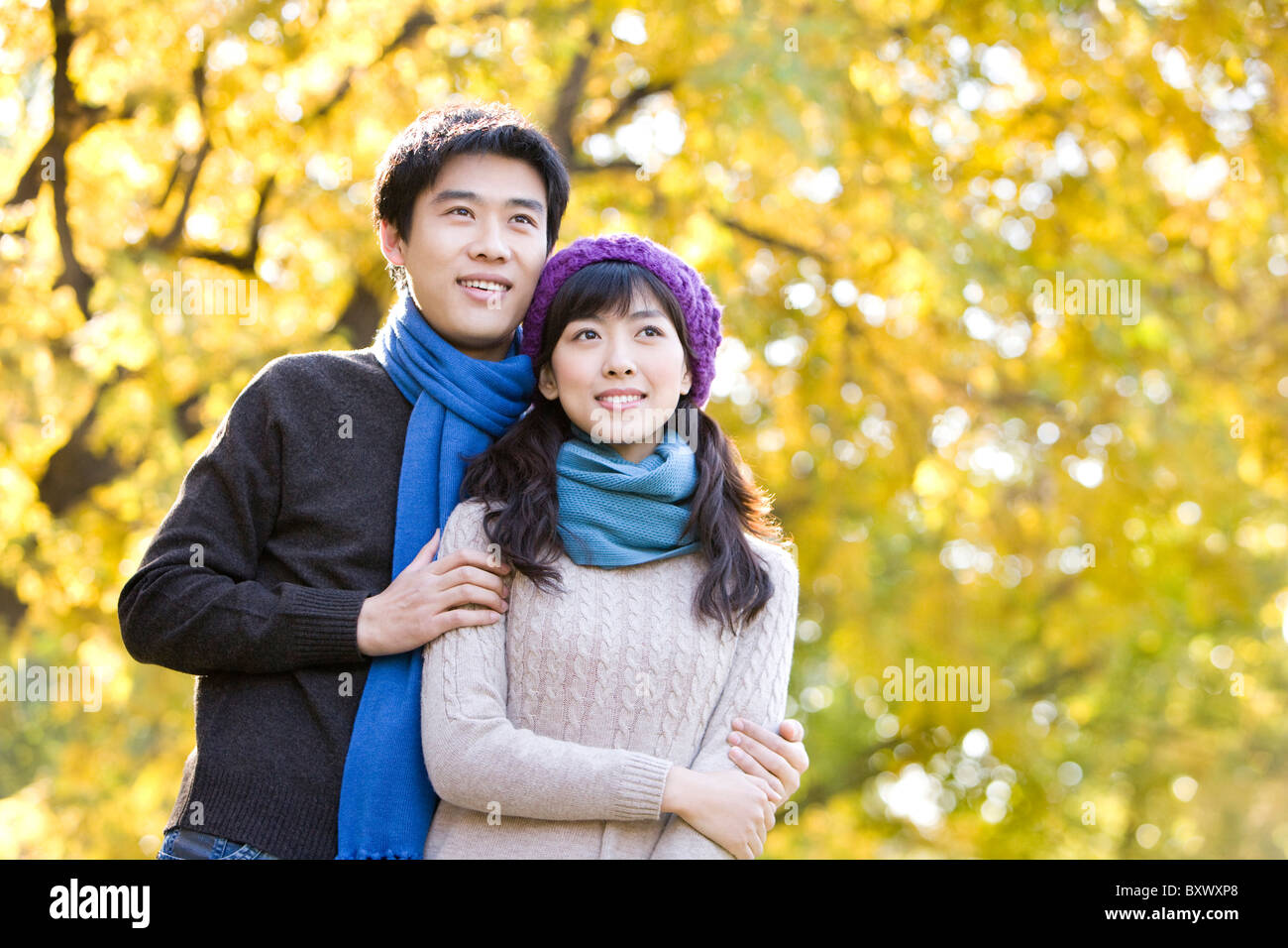 Young Couple Enjoying a Park in Autumn Stock Photo - Alamy
