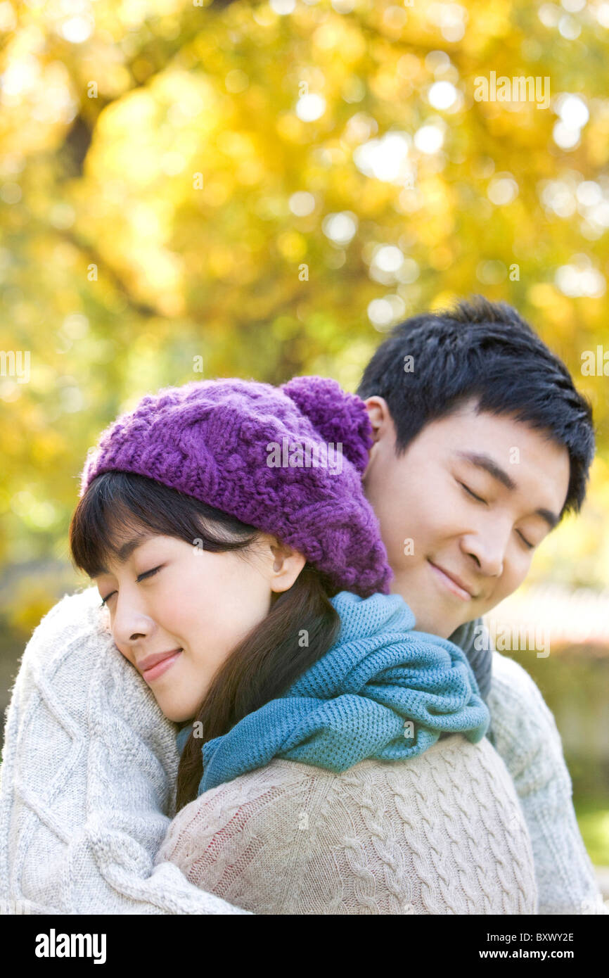 Young Couple Enjoying a Park in Autumn Stock Photo - Alamy