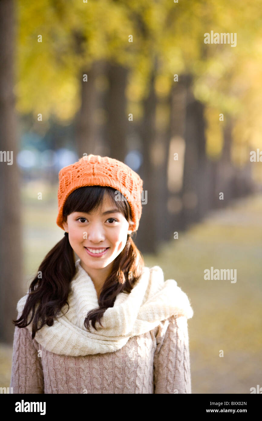 Young Woman in a Park in Autumn Stock Photo - Alamy