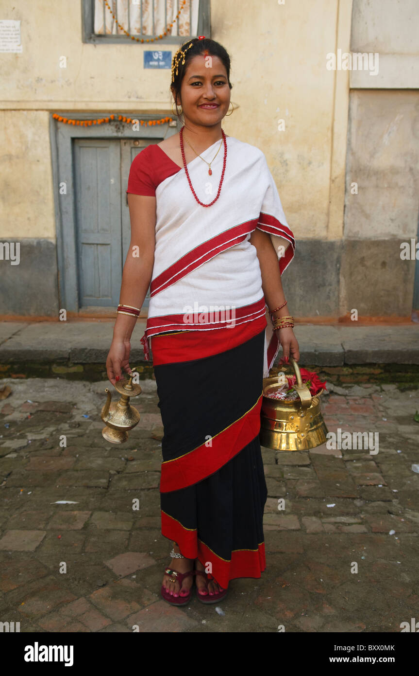 portrait of a woman in traditional dress in Durbar Square, Kathmandu, Nepal Stock Photo