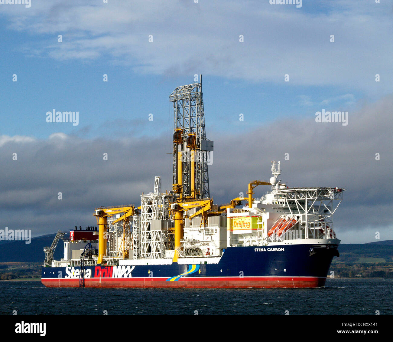 The Drillship Stena Carron leaving the Cromarty Firth, on route to drill deepwater oil wells in the waters near Greenland. Stock Photo