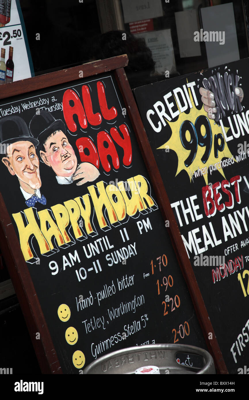 Sign outside a public house advertising All Day Happy Hour Alcoholic Drinks Stock Photo
