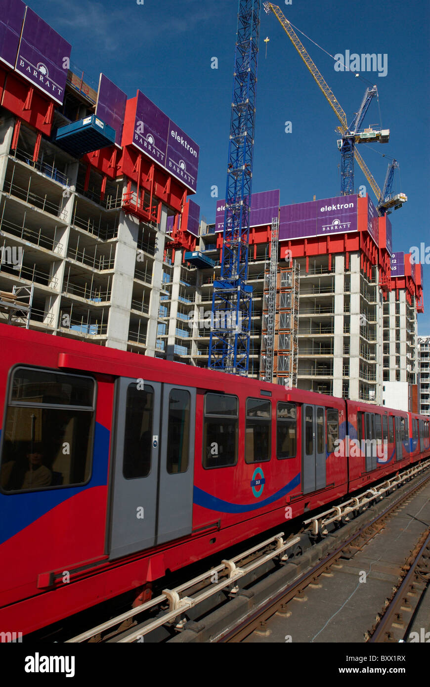 Docklands housing construction and DLR East London UK Stock Photo - Alamy