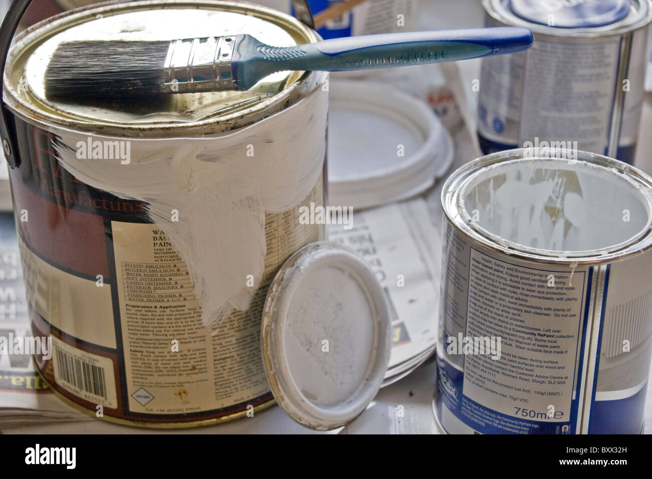 Paint tins and brushes for decorating Stock Photo Alamy