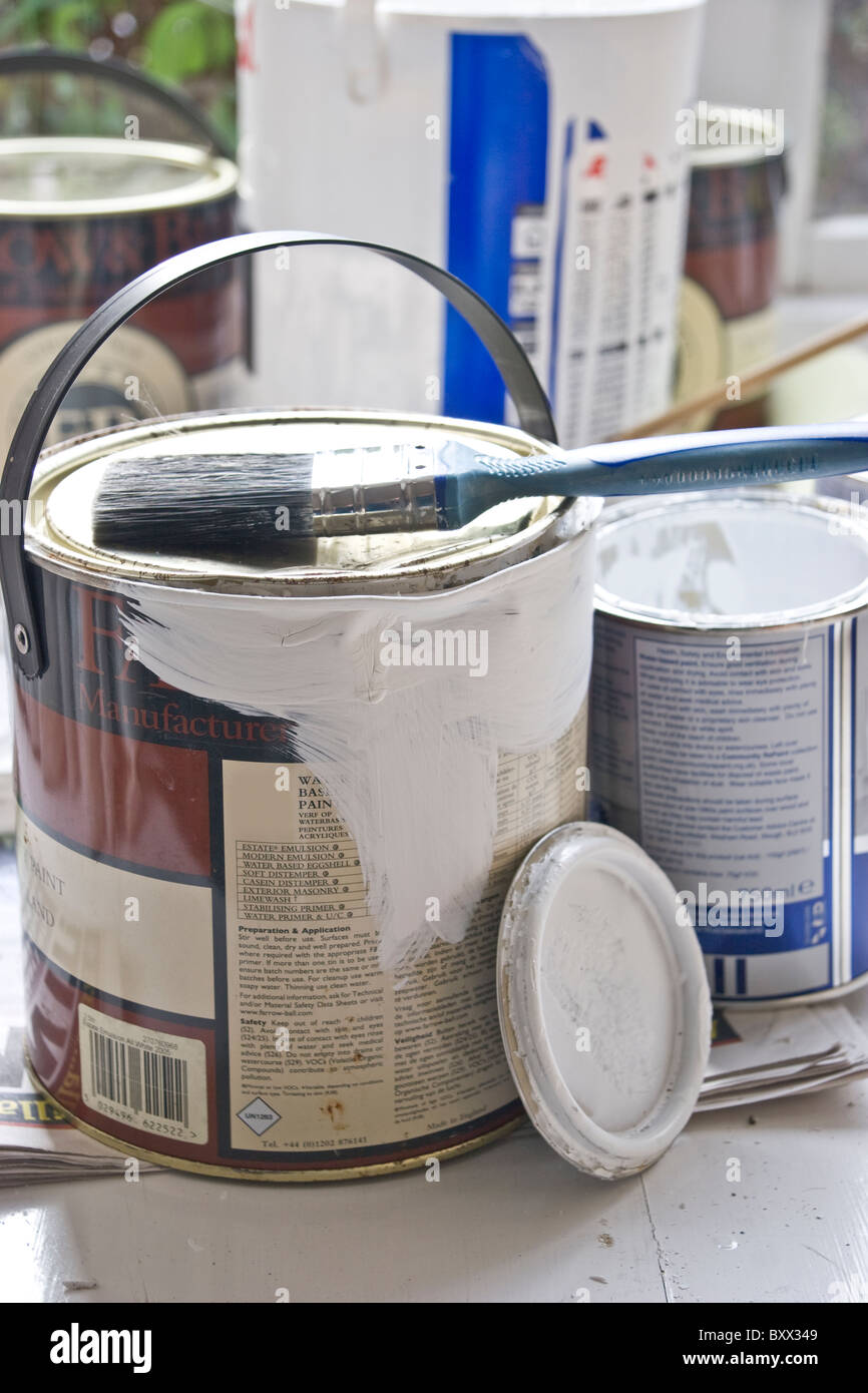 Paint tins and brushes for decorating Stock Photo Alamy