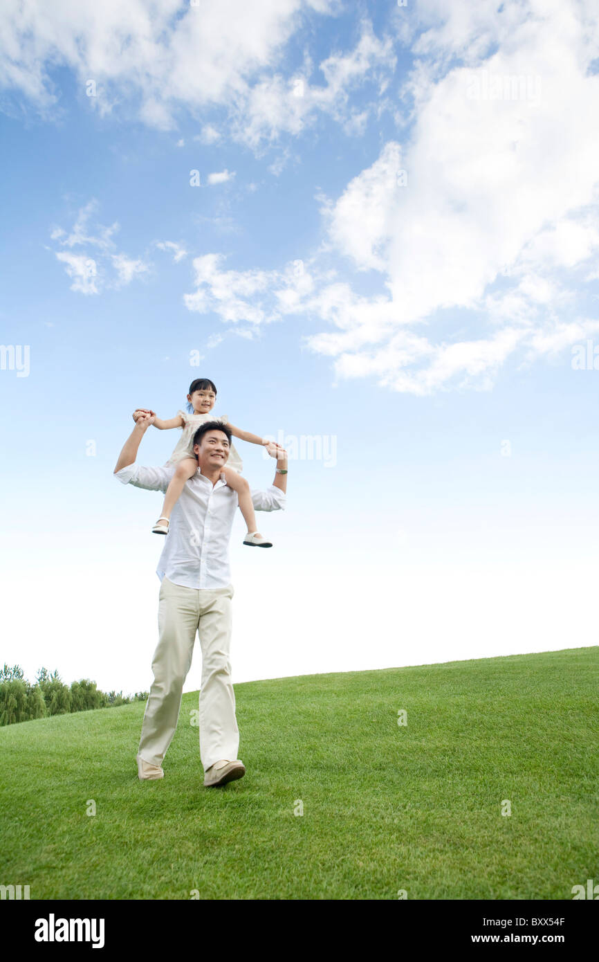 Father and daughter playing in the park Stock Photo - Alamy