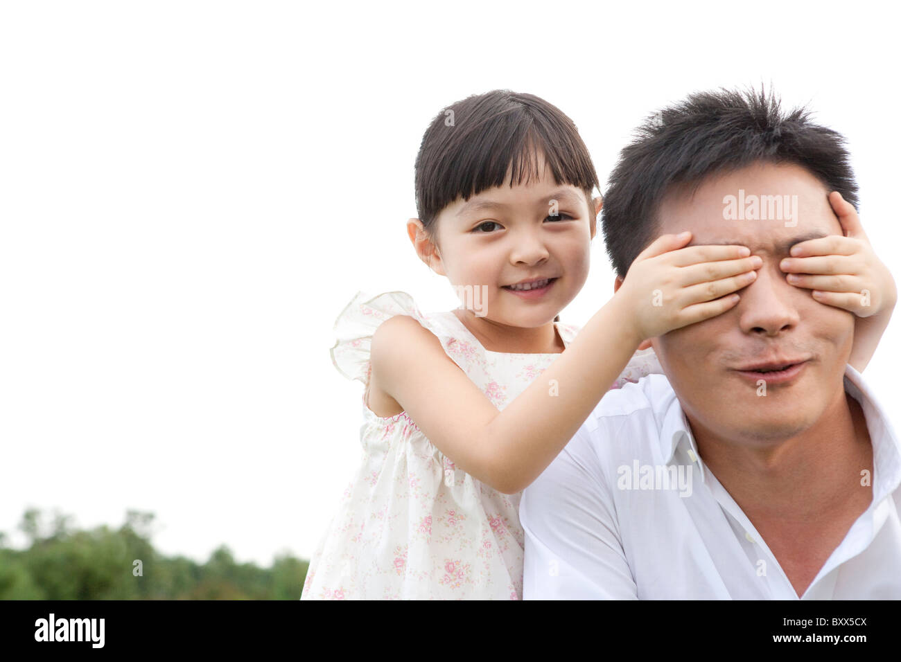 Father and daughter playing in the park Stock Photo - Alamy