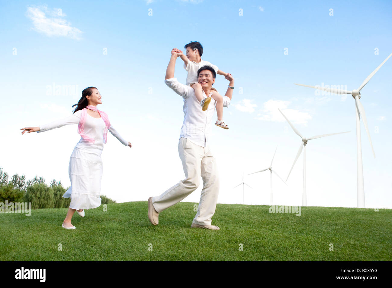 Family with windmill Stock Photo