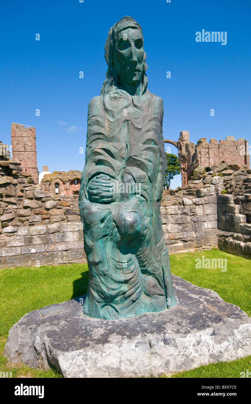 St Cuthbert sculpture by Fenwick Lawson in grounds of Lindisfarne