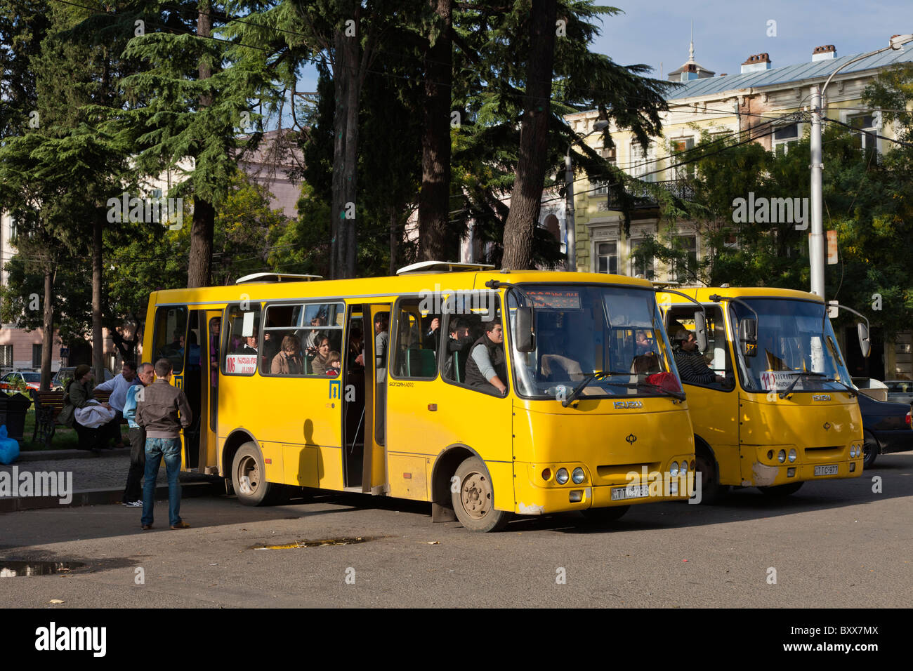 Local buses full of passengers at bus station in Tbilisi