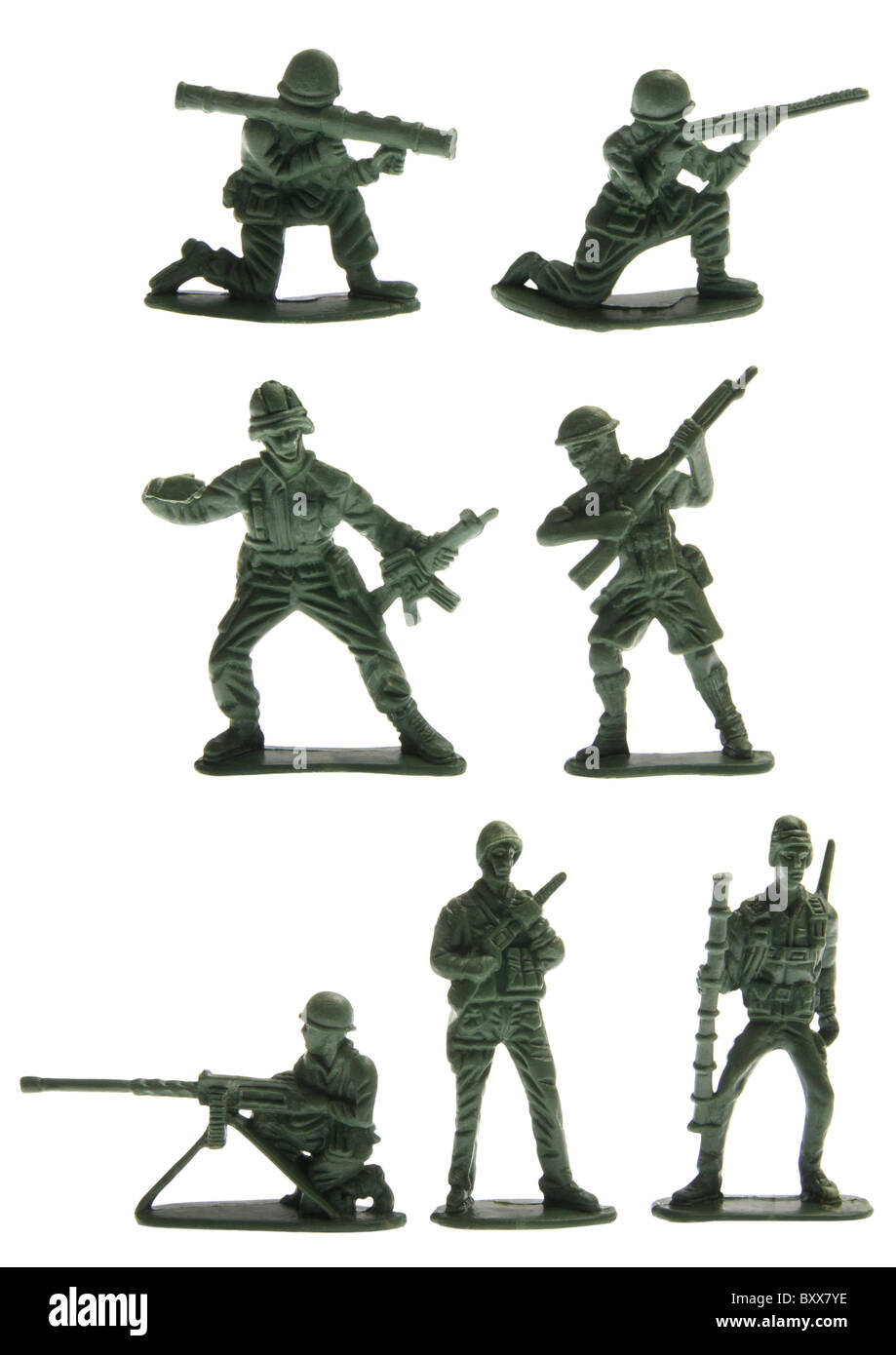 Green plastic toy soldiers on white background Stock Photo