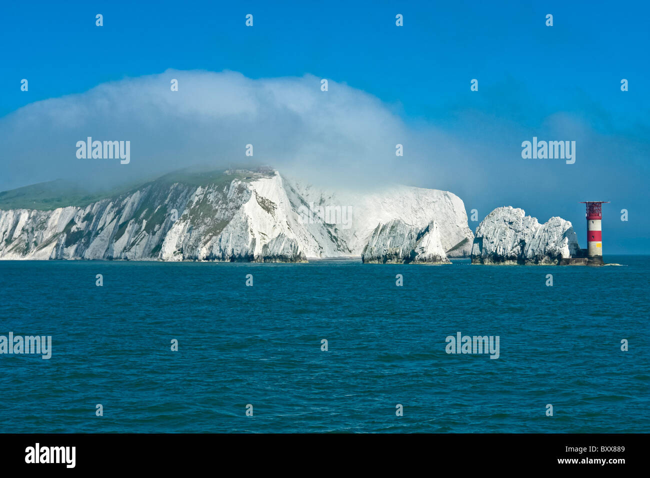 The Needles and Needles Lighthouse at the western end of Isle of Wight in Southern England Stock Photo